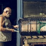 Fisherman Mending Pots